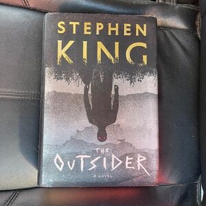 'The Outsider' Hardcover Book